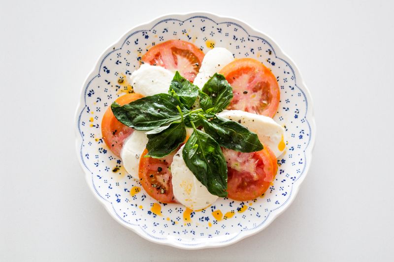 Fresh Caprese salad with buffalo mozzarella at Punch pizza