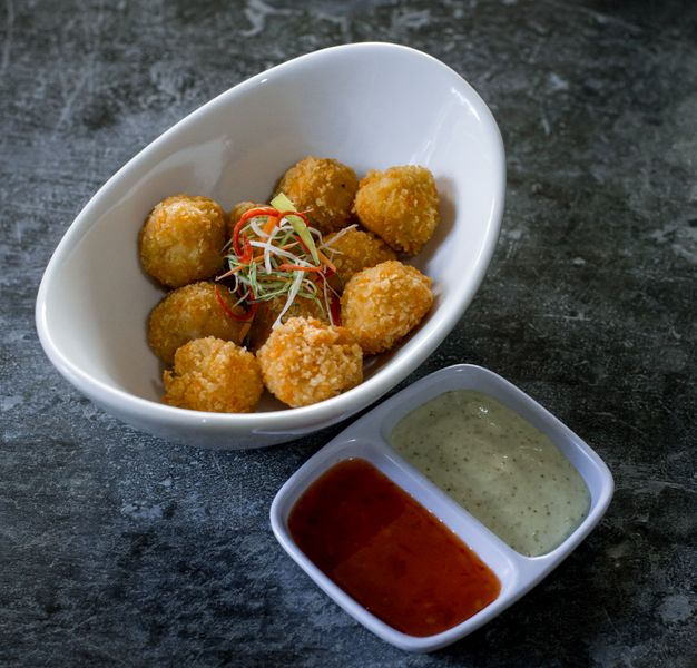 Golden arancini rice balls at Punch pizza